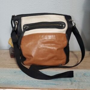 The Sak Black, White, and Brown Messenger Bag